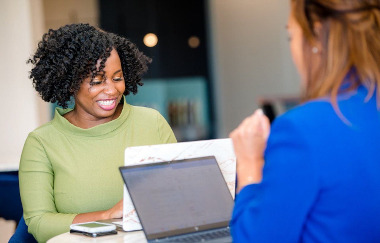 Two woman working in laptop