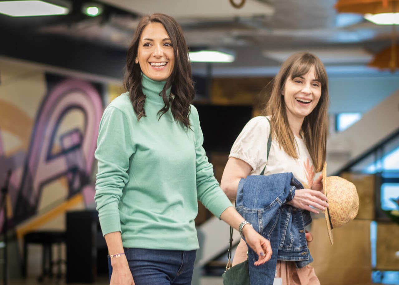 Gabriela walking with a colleague