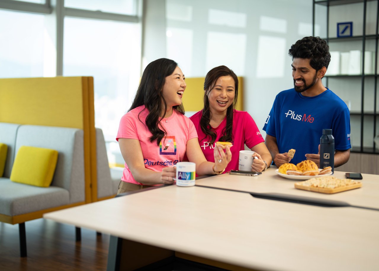 Colleagues exchanging a lighter moment at Deutsche Bank office in Hong Kong