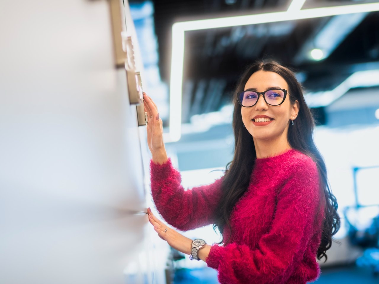 Woman in front of whiteboard