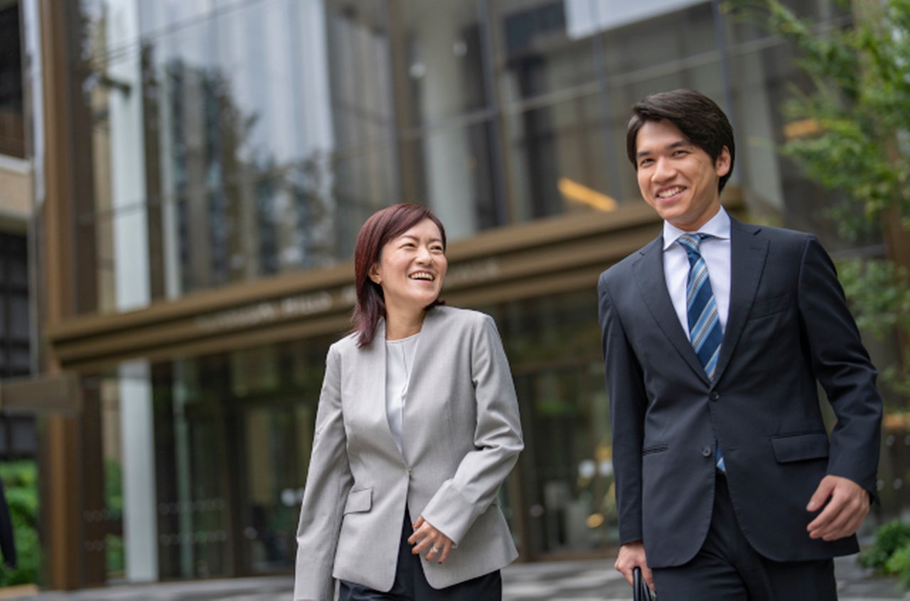 A man and a woman walking