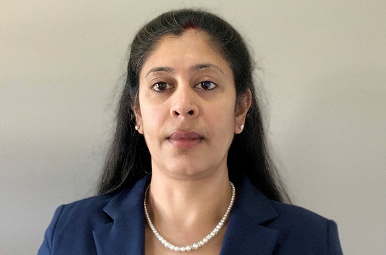 Portrait of Gayathri wearing a necklace