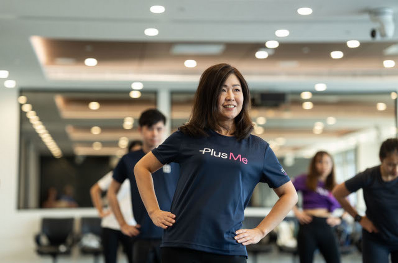 Colleagues excersising at Deutsche Bank office in Hong Kong