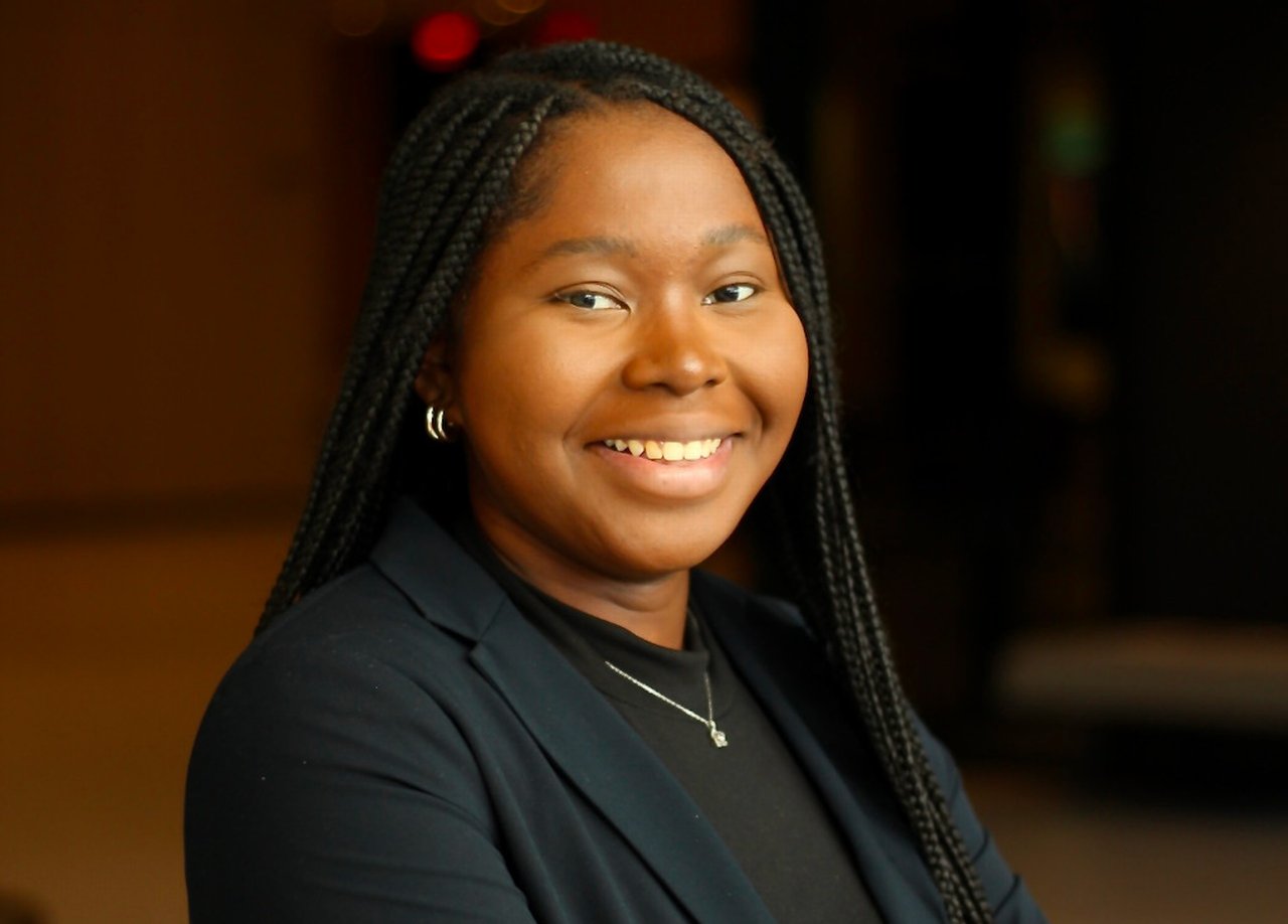 Smiling graduate profile picture