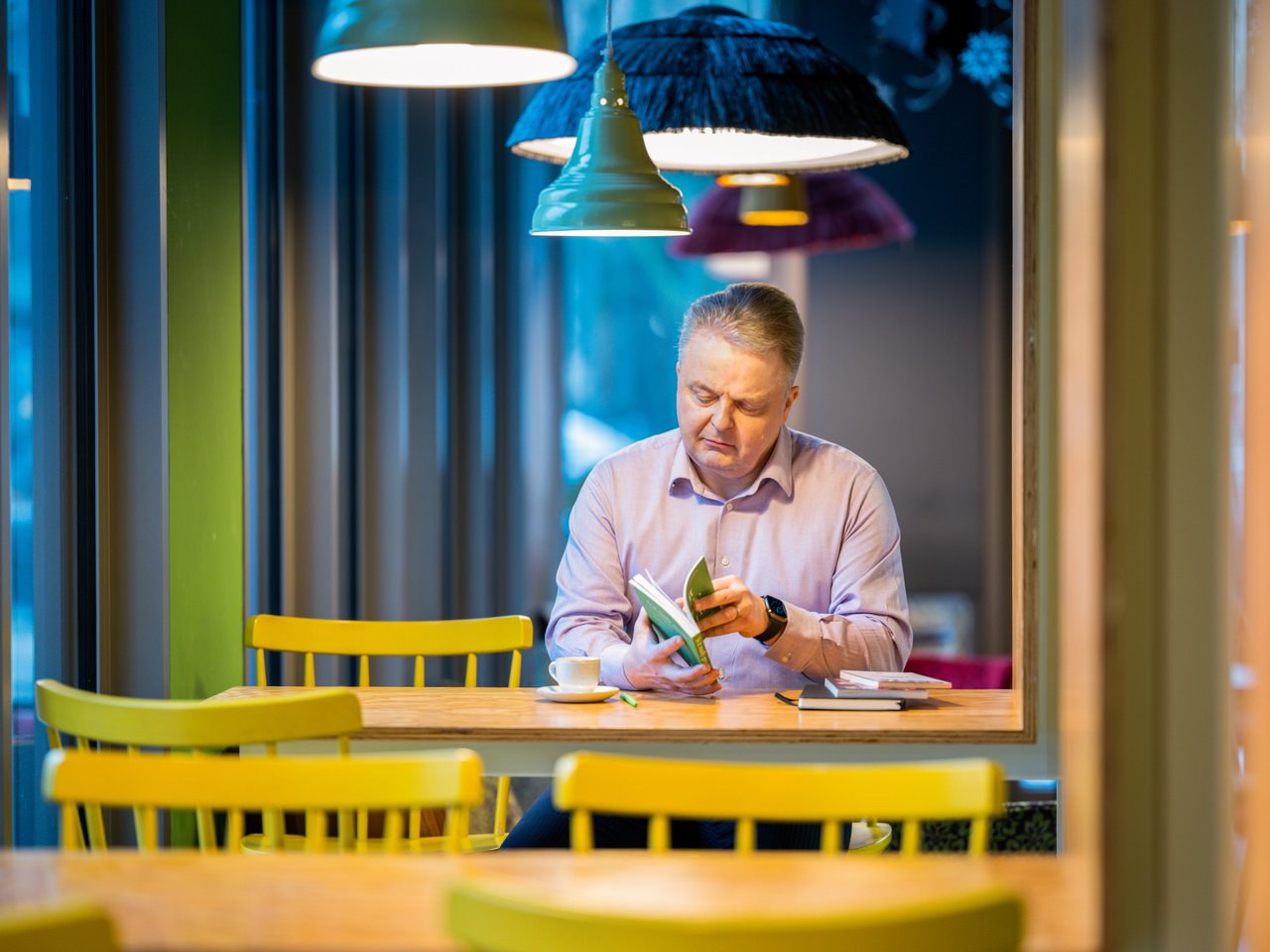 Man having a lunch in cafeteria at Deutche Bank
