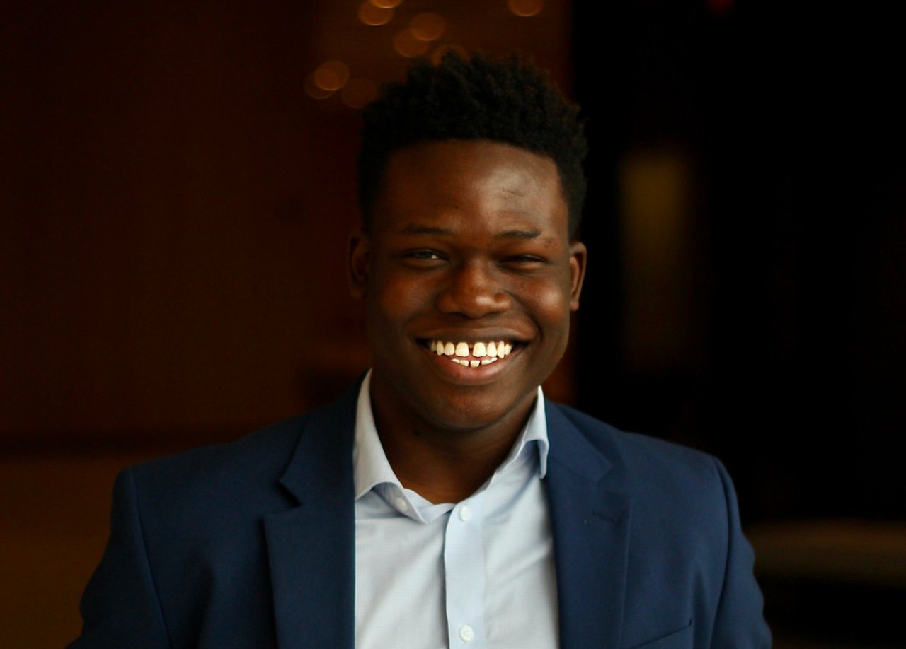 Smiling graduate profile picture