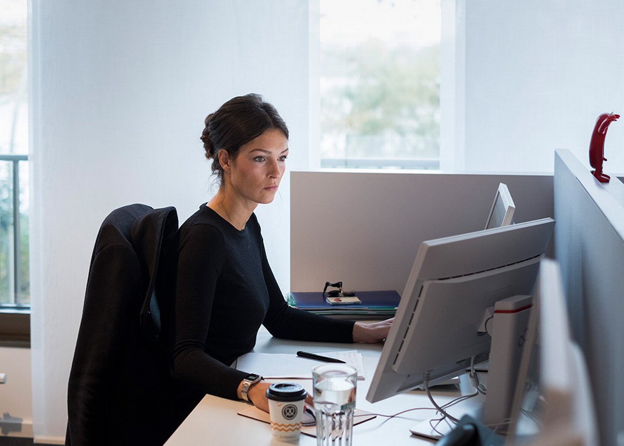 Juliane is working at her desk