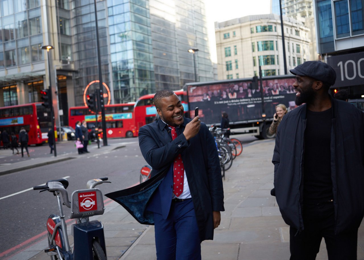 Selasi and a colleague are walking through London