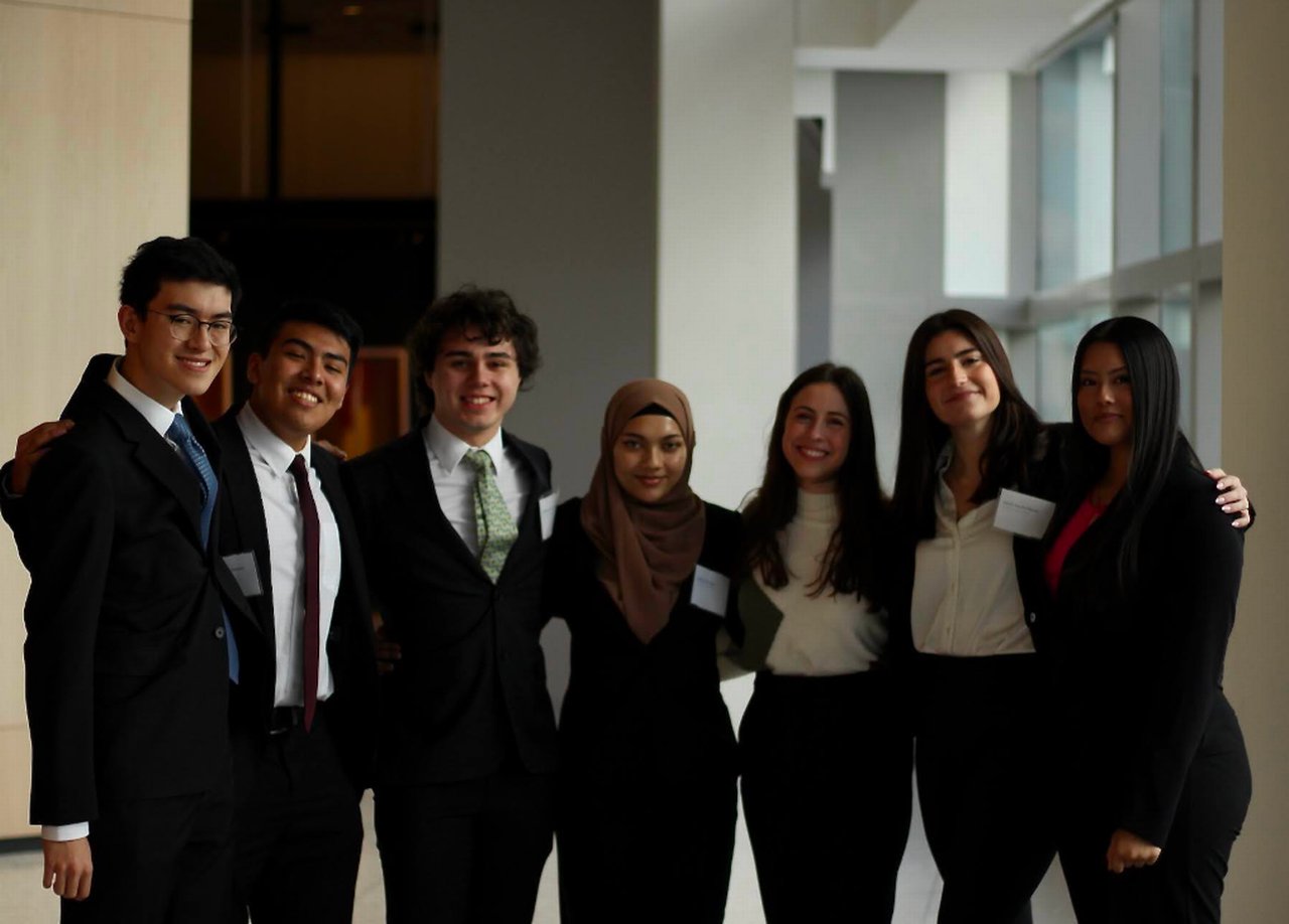 Group photo with seven students from the db Develop program