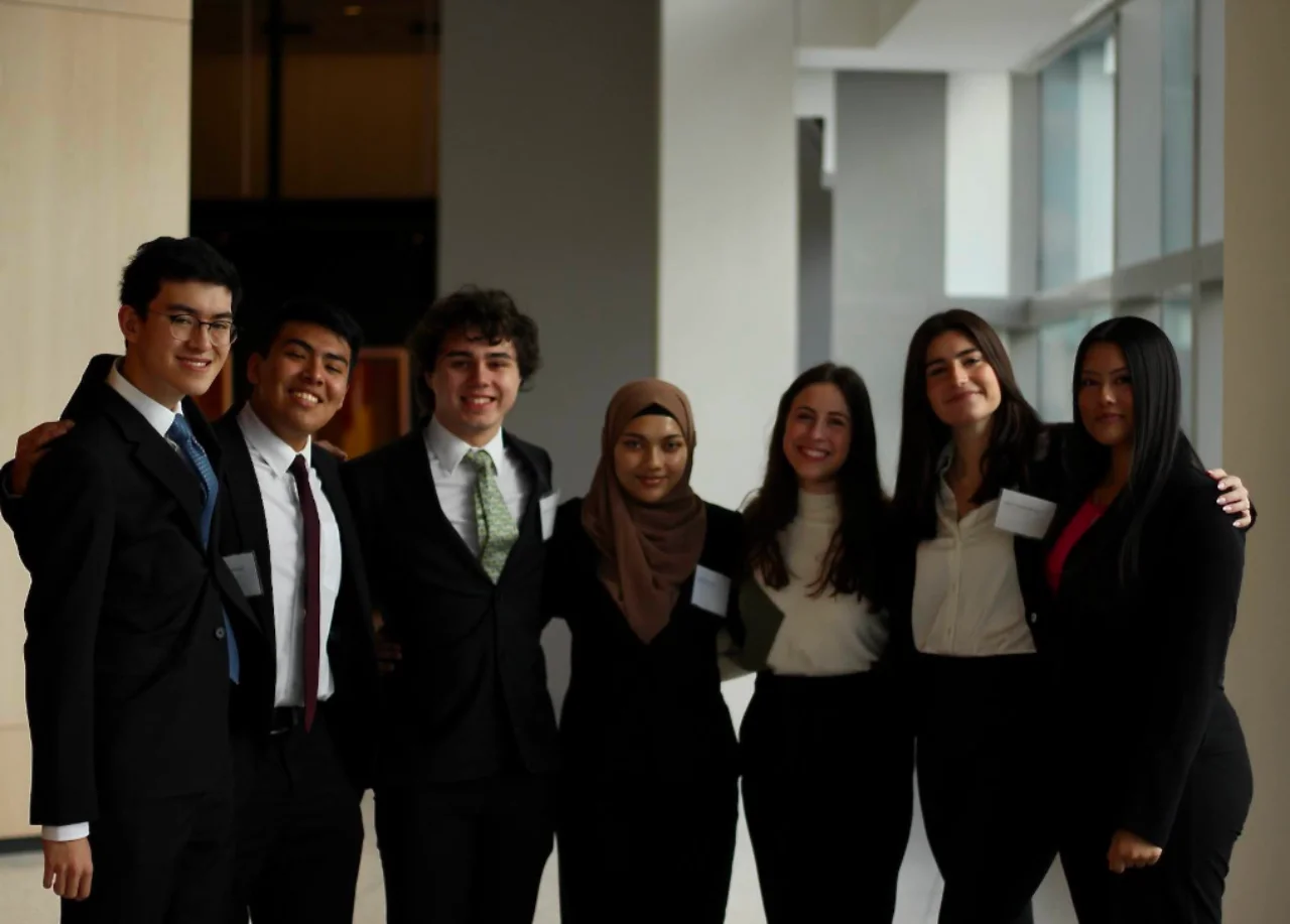 Group photo with seven students from the db Develop program