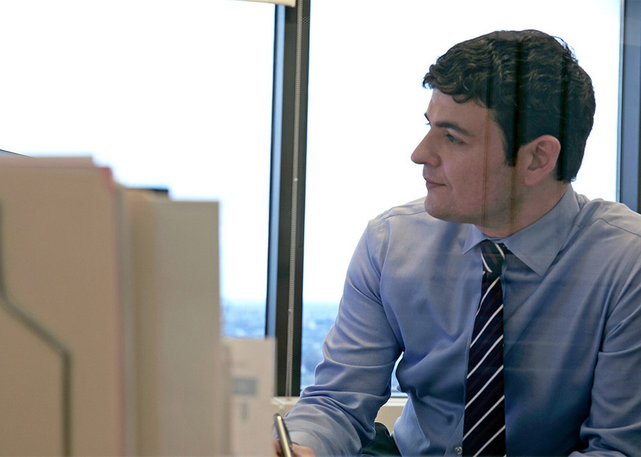 Mike working at his desk