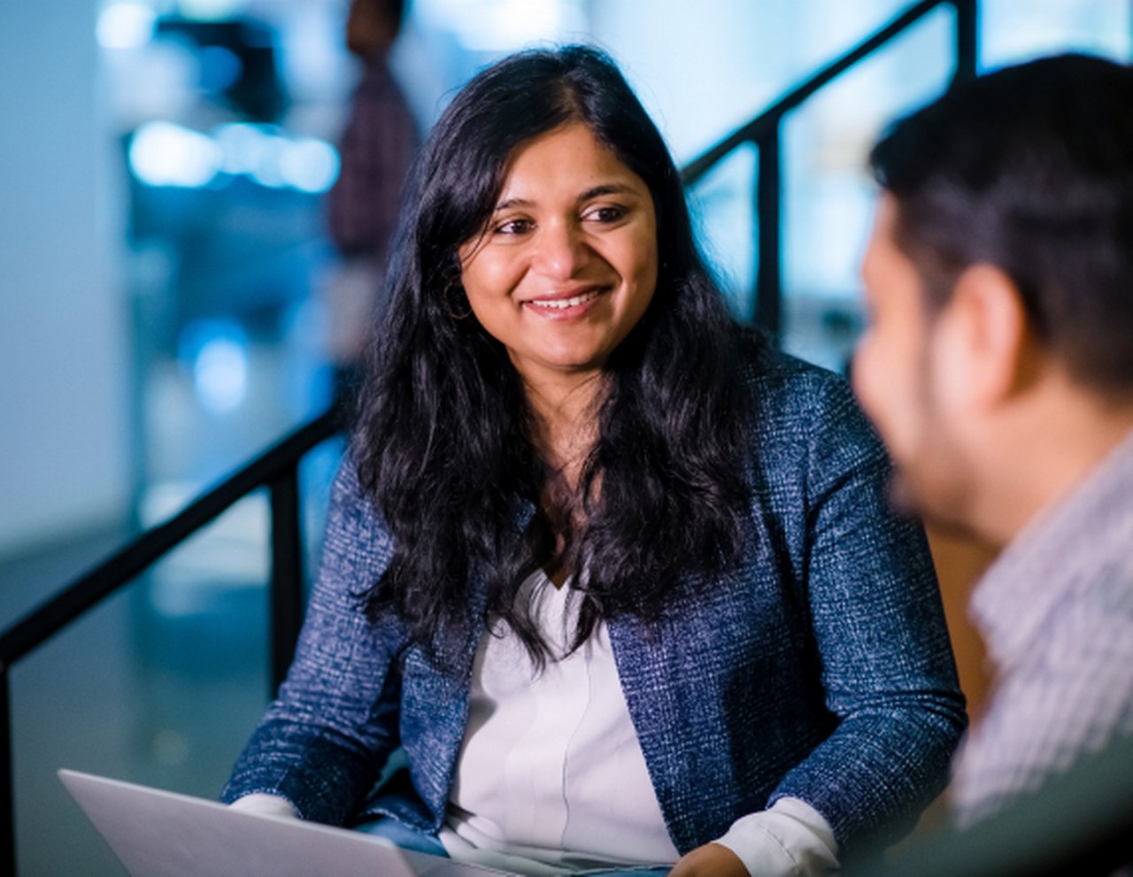 Woman-smiling-in-office.jpg