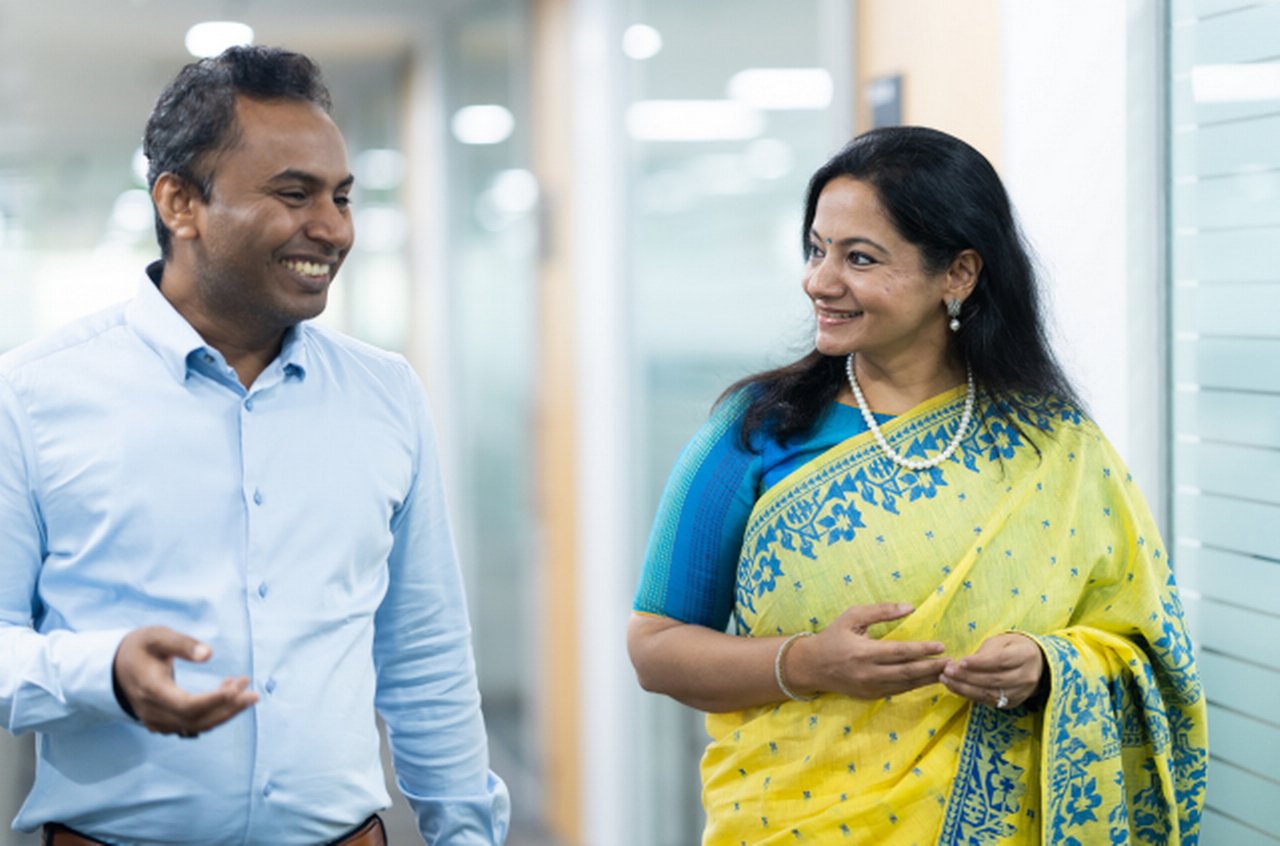 two people discussing